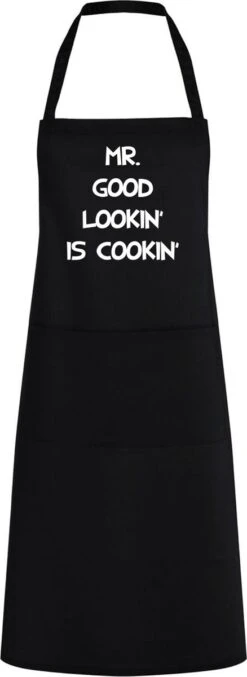 Roly Keukenschort Mr. Good Lookin' Is Cookin' - One Size - Zwart - Vaderdag Cadeau - Papa Cadeau - Cadeau Voor Hem - Cadeau Voor Vader - Keukenschort Met Tekst